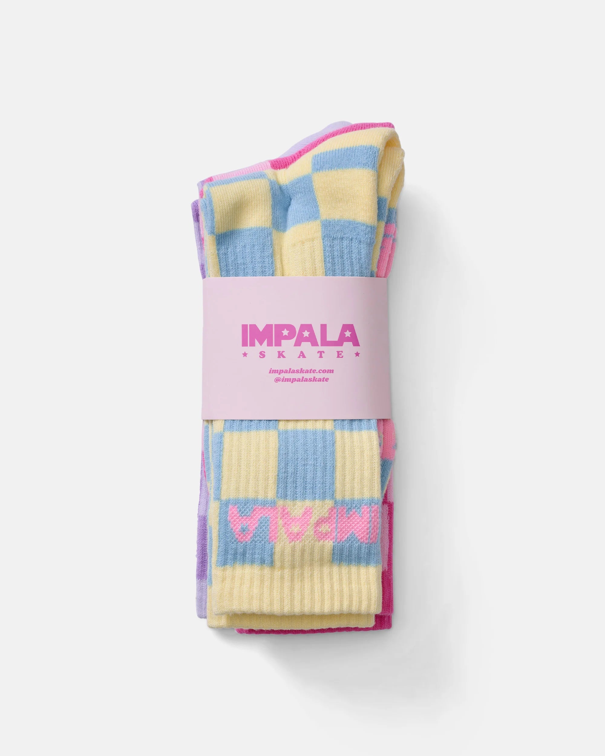 Three-pack skate socks in check patterns, pastel purple, blue, and pink