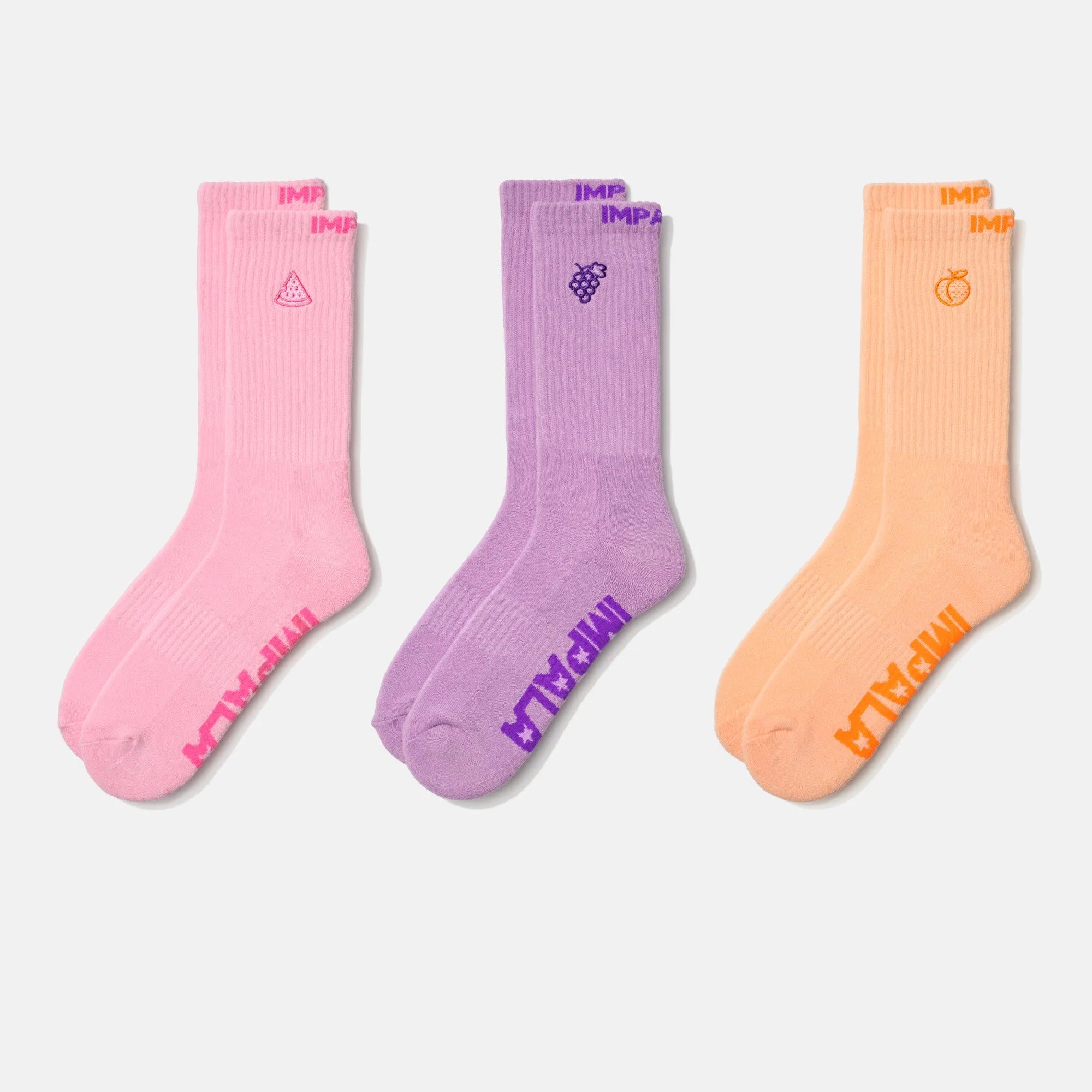 3-pack crew socks with vertical stripe knit in pink, purple, and orange fruit graphics