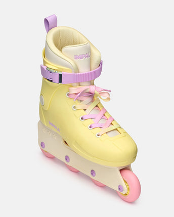 Impala buttercup yellow inline skate with pink laces and purple adjustable strap