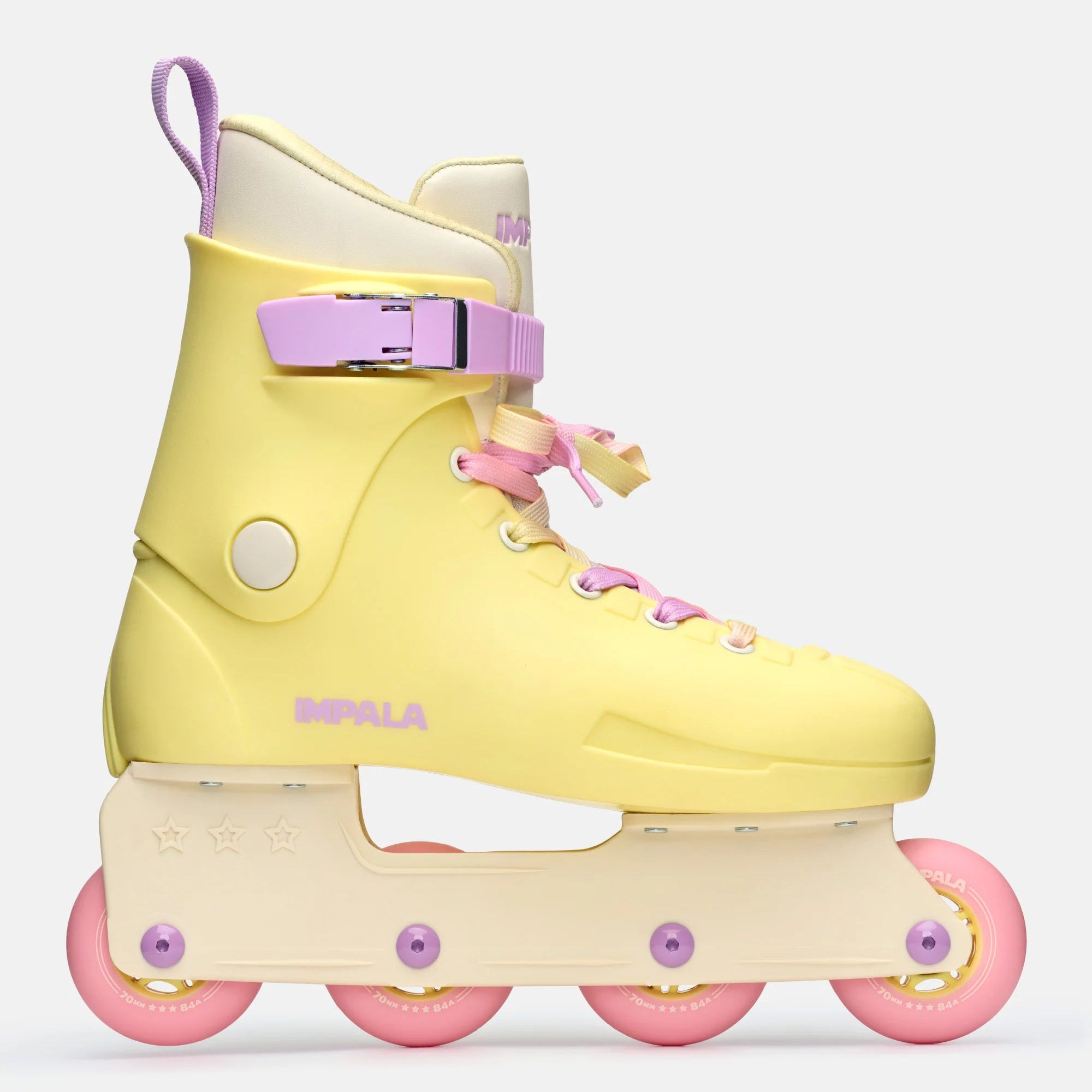 Impala buttercup yellow inline skate with purple buckle strap and pink wheels