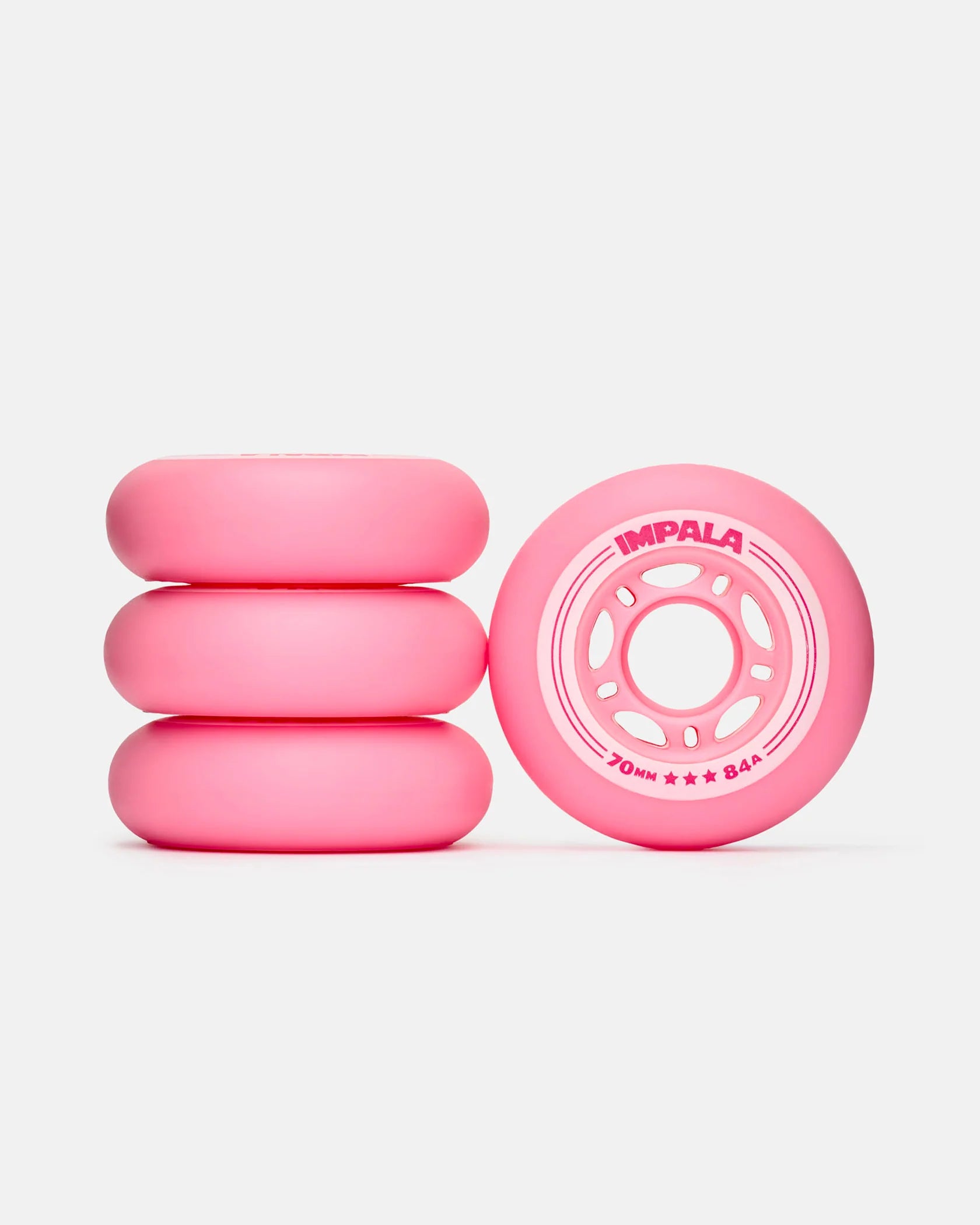 Pink inline skate wheels with white hub holes, 4-pack