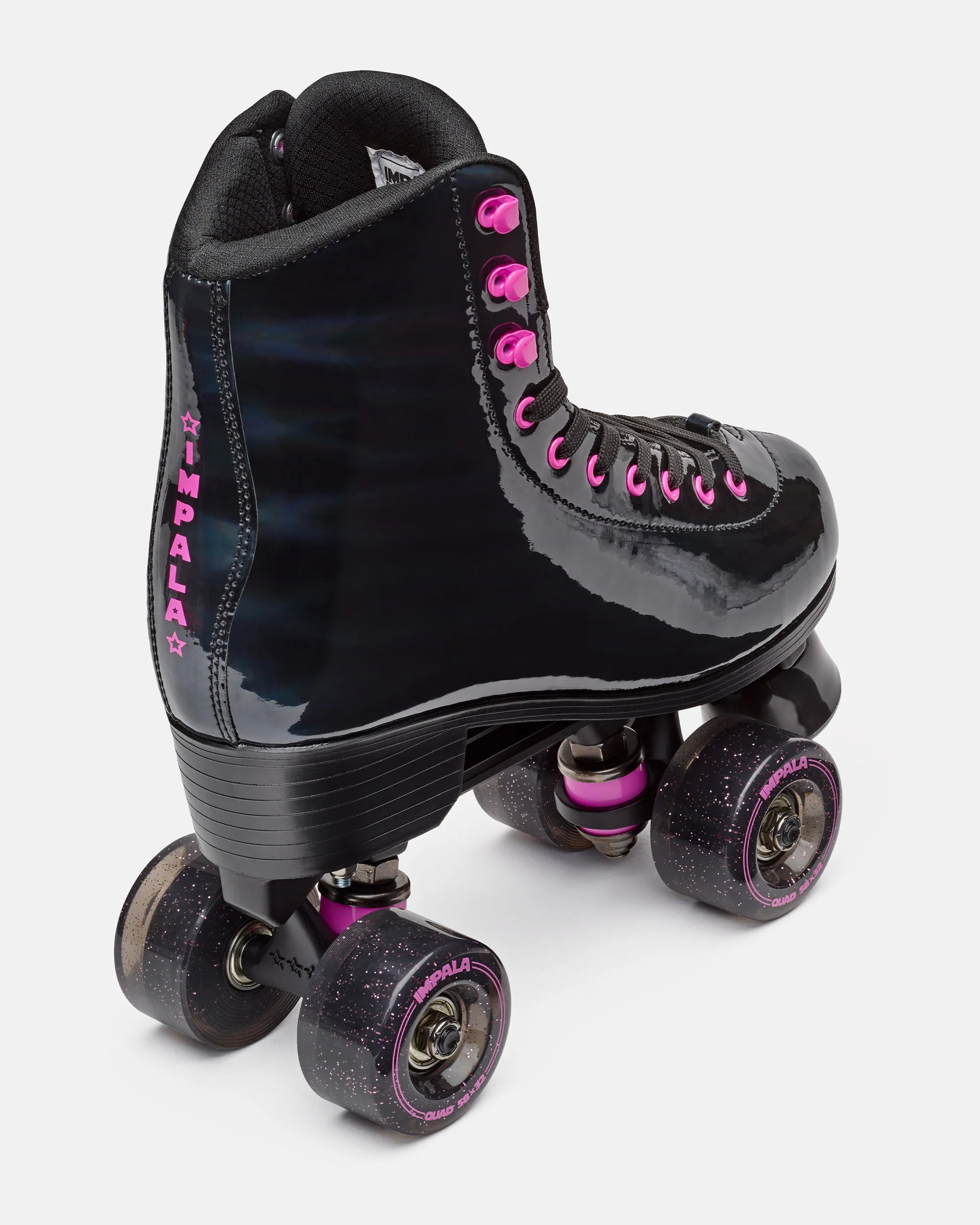 Black high-top quad skate angled side view with pink laces and glittery wheels