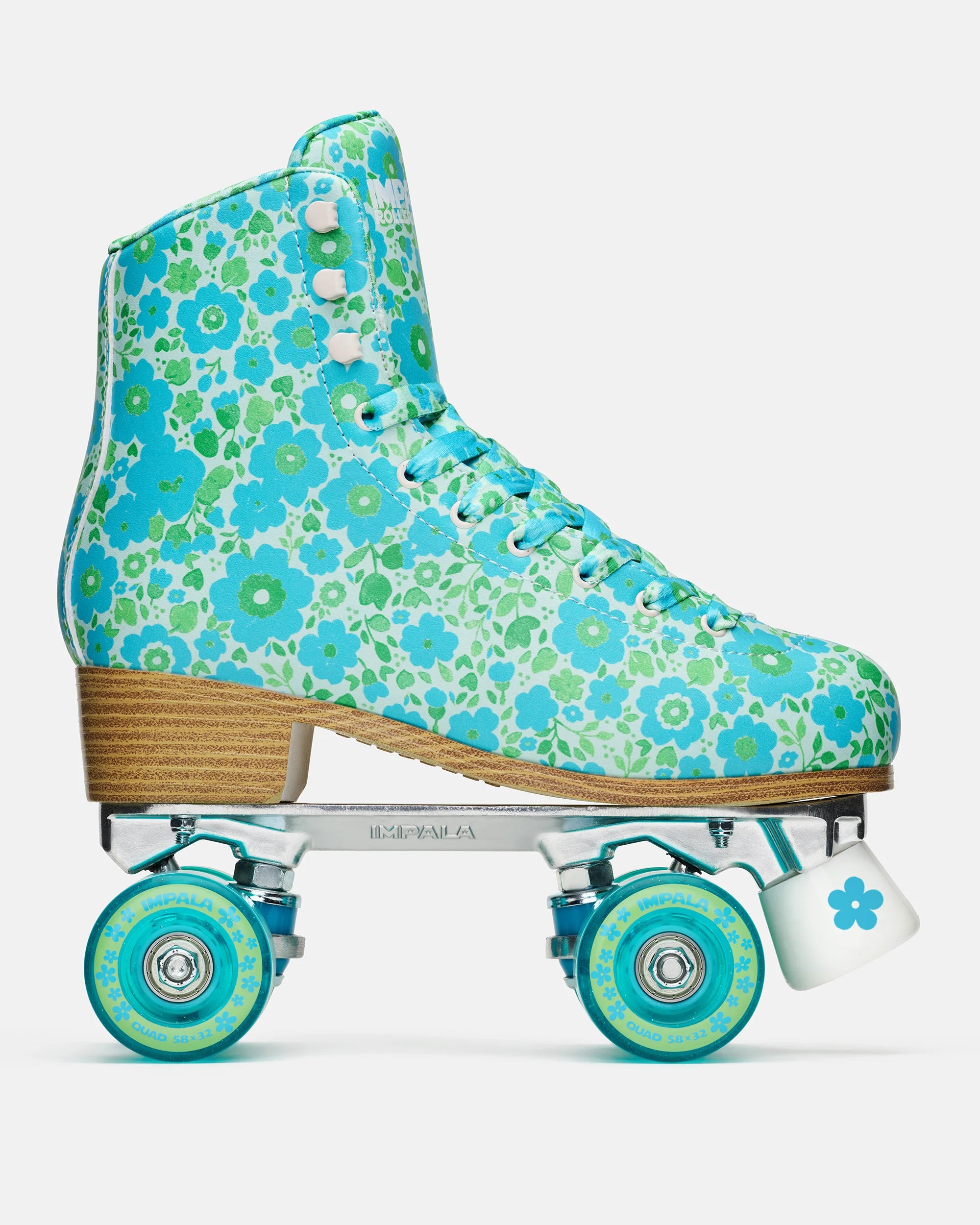 Turquoise high-top quad roller skates with ditsy floral pattern and wooden sole, front view.