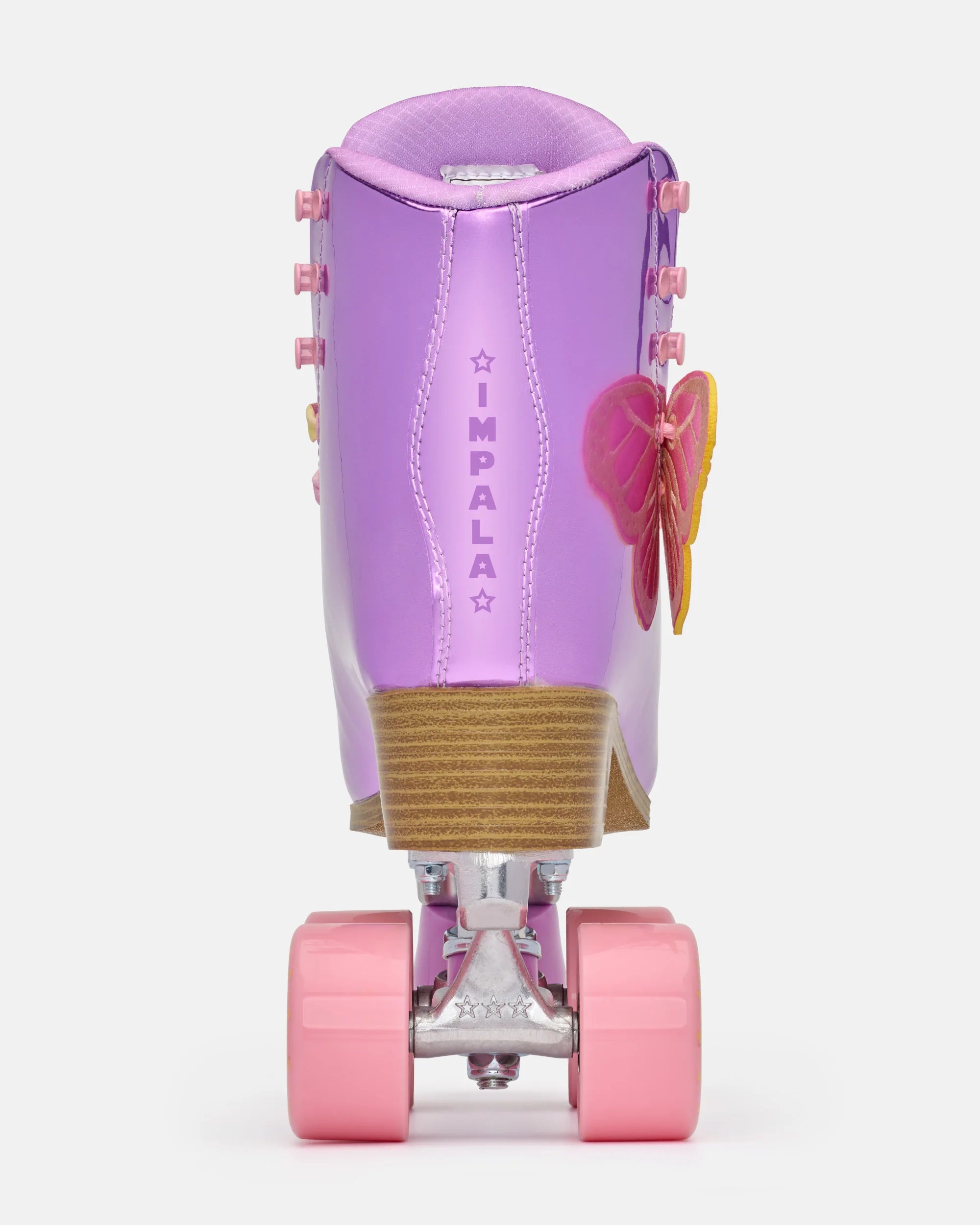 Lavender quad roller skates with gold textured heel and pink wheels, rear view