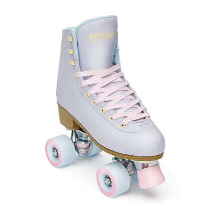 Periwinkle quad roller skates with white high-top boot, gold heel, and pink wheels.