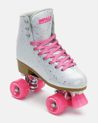 Kids quad roller skates side view, light gray confetti glitter boot, pink laces, pink wheels