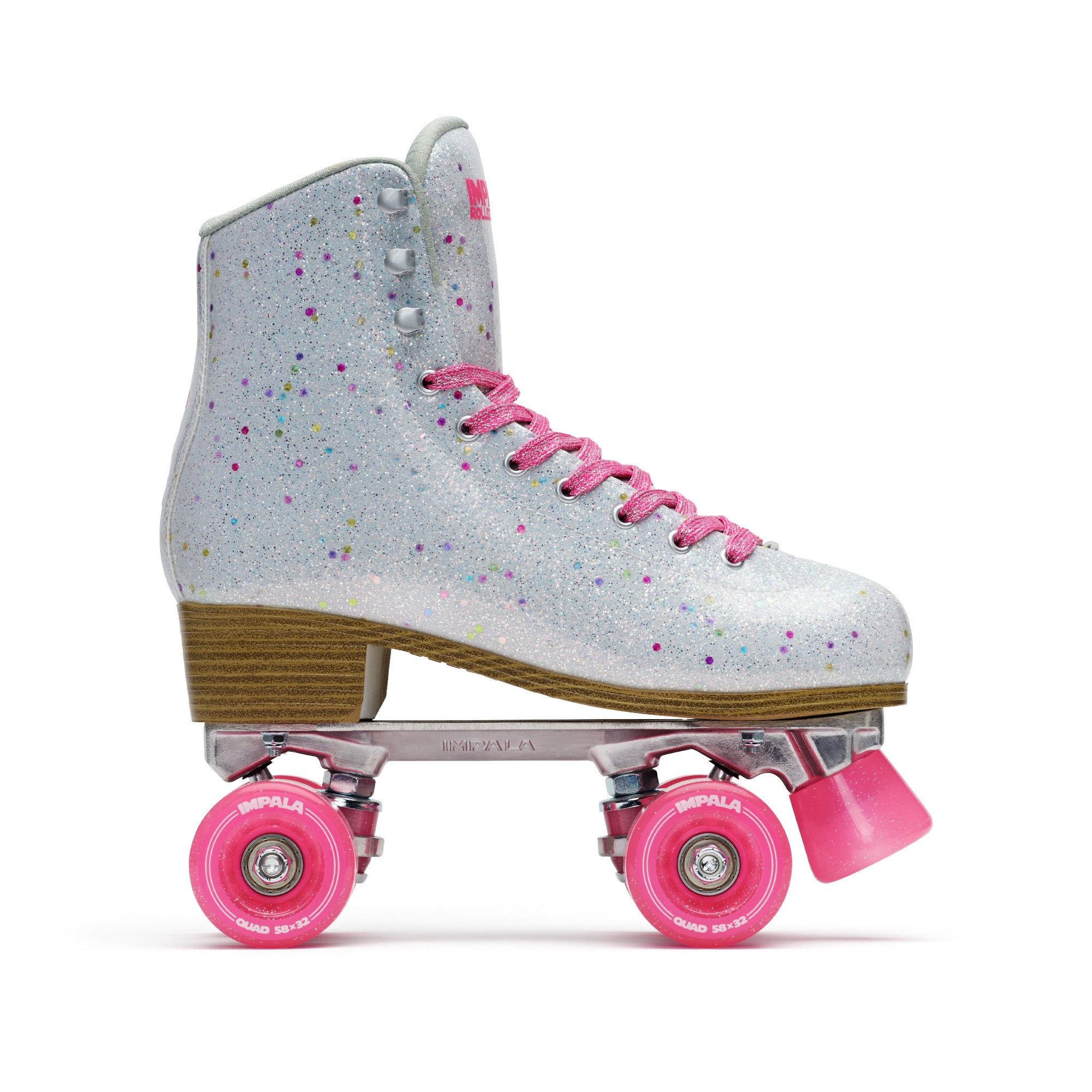 Confetti-print quad skates with pink laces and bright pink wheels, tan wooden sole