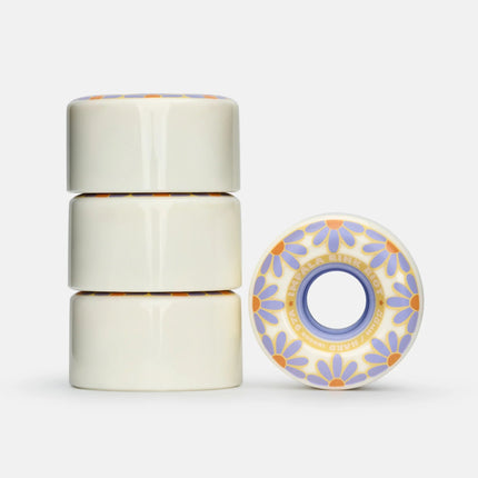 Impala Quad Rink Riot skateboard wheels, 4-pack, off-white with blue flower hub