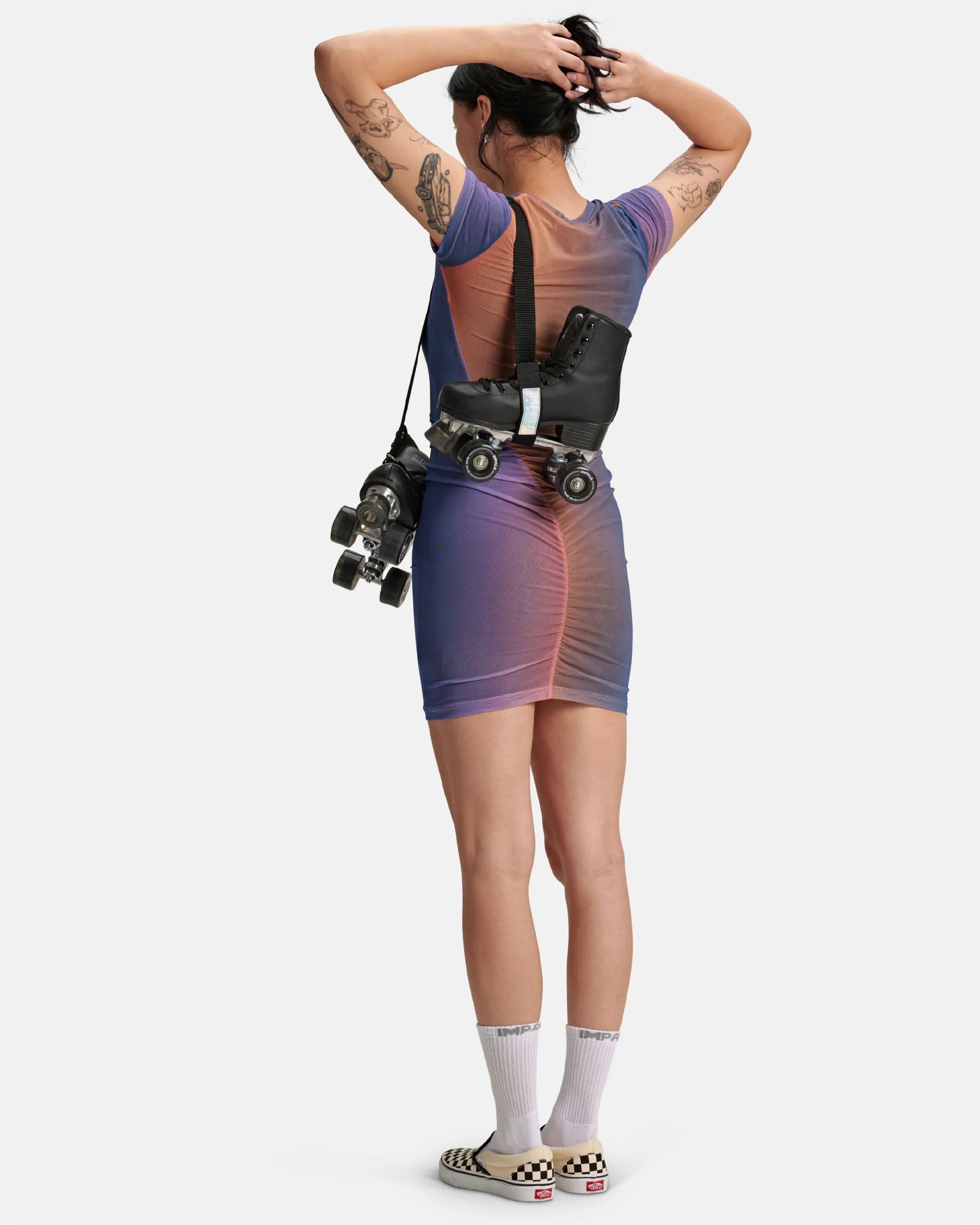 Black skate strap worn with quad roller skates