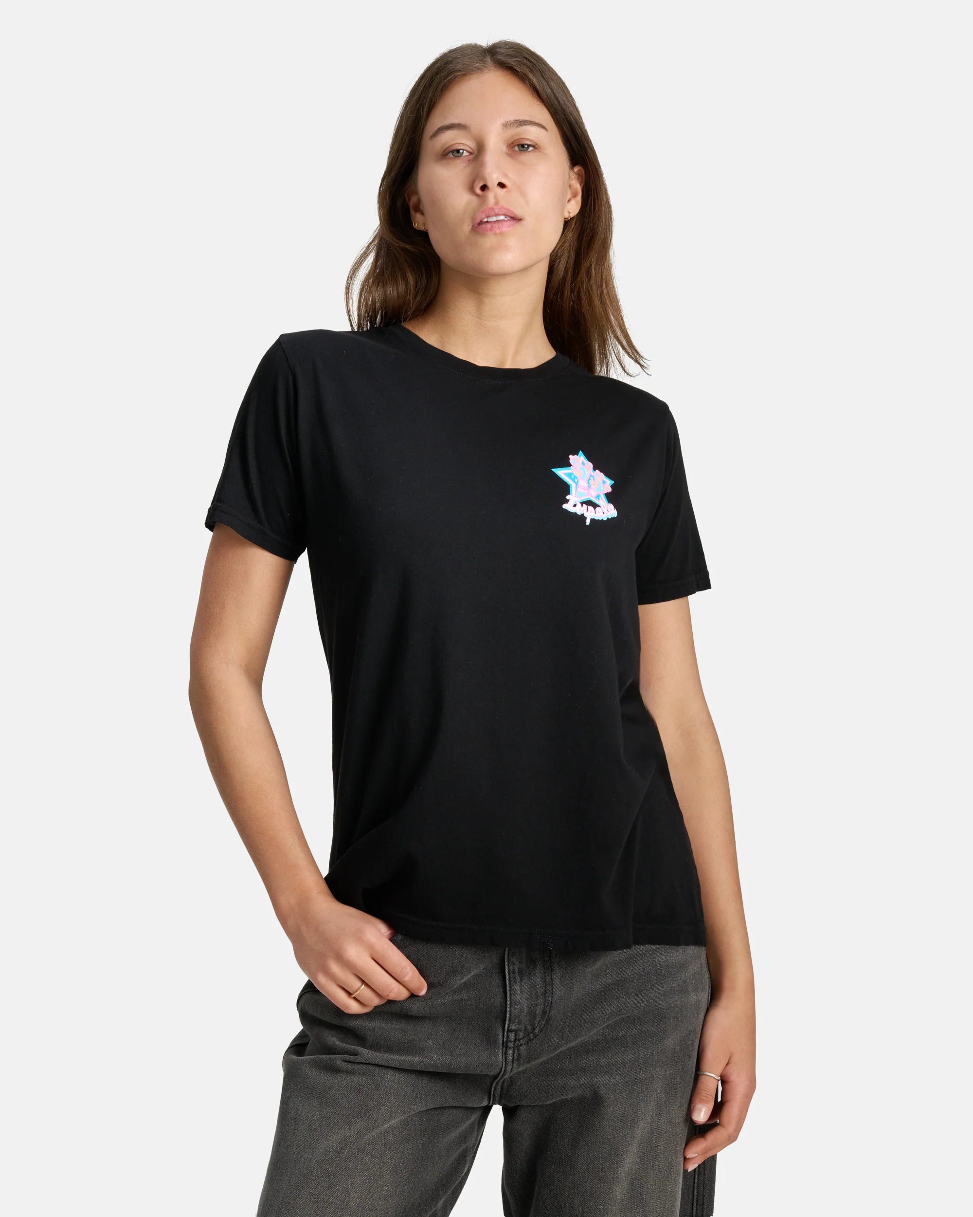 Black graphic T-shirt on model with short sleeves and small chest star logo