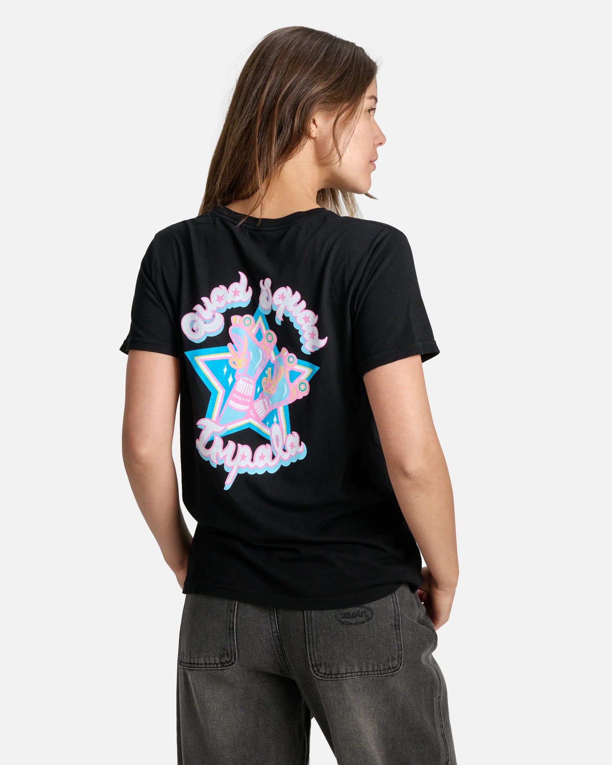 Black T-shirt on model with large multicolor back graphic