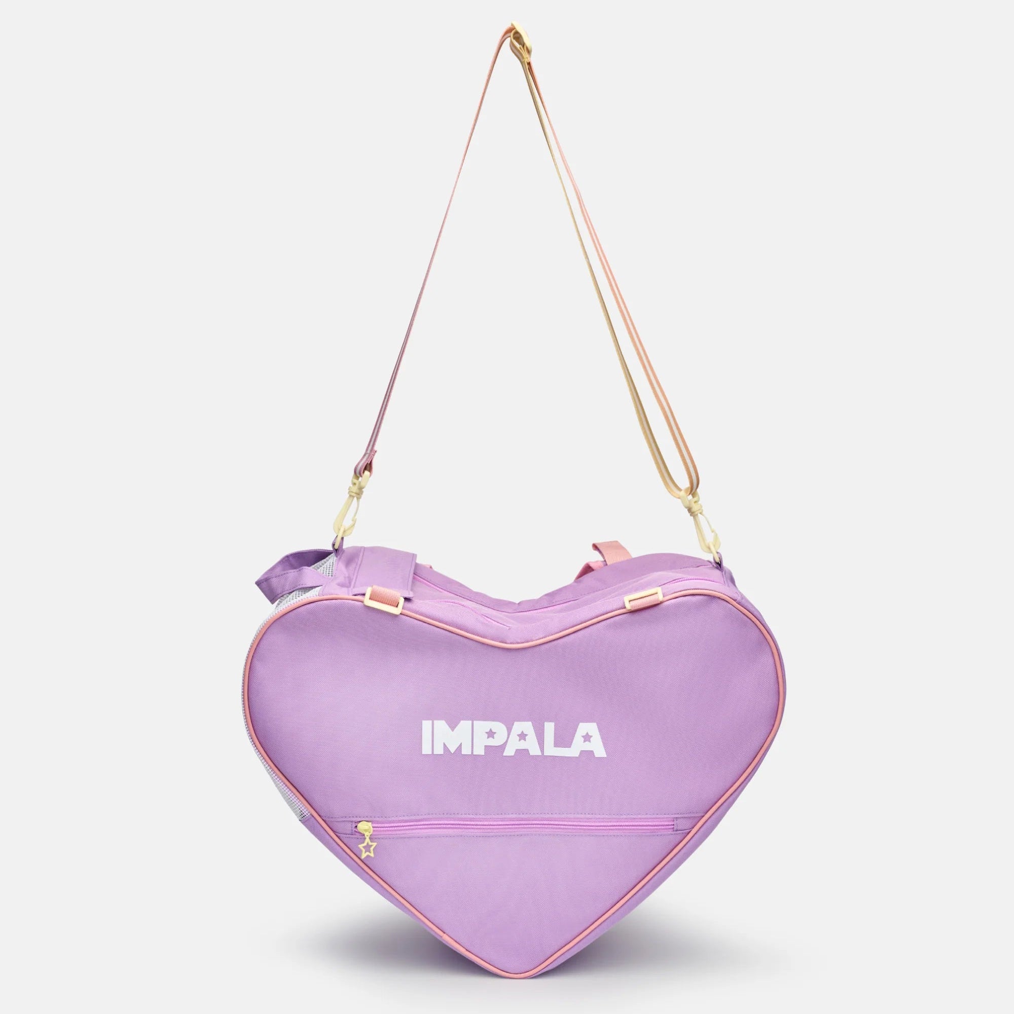 Lavender heart-shaped skate bag with adjustable shoulder strap and zipper closure