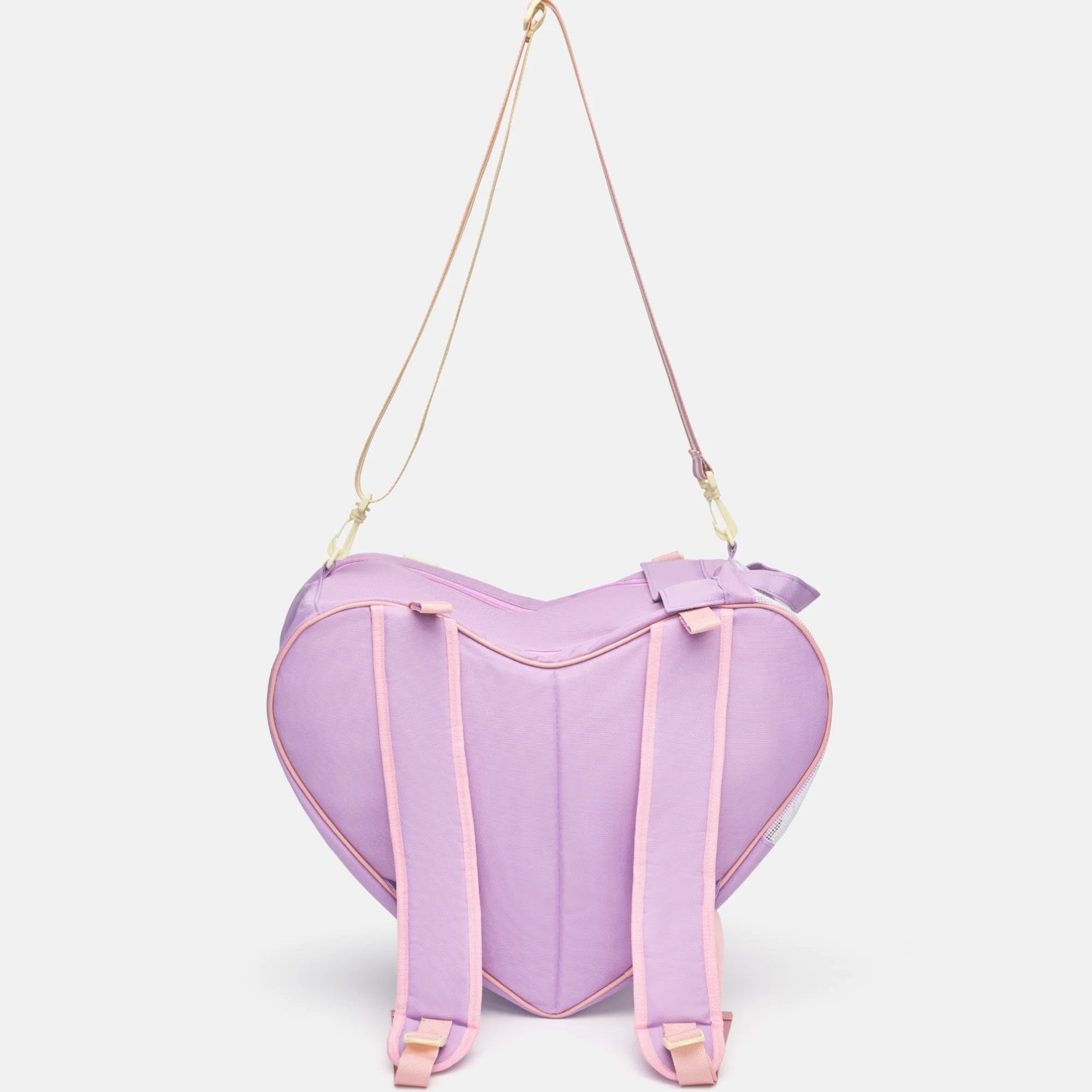 Lavender heart-shaped skate bag with adjustable shoulder straps and rear flap