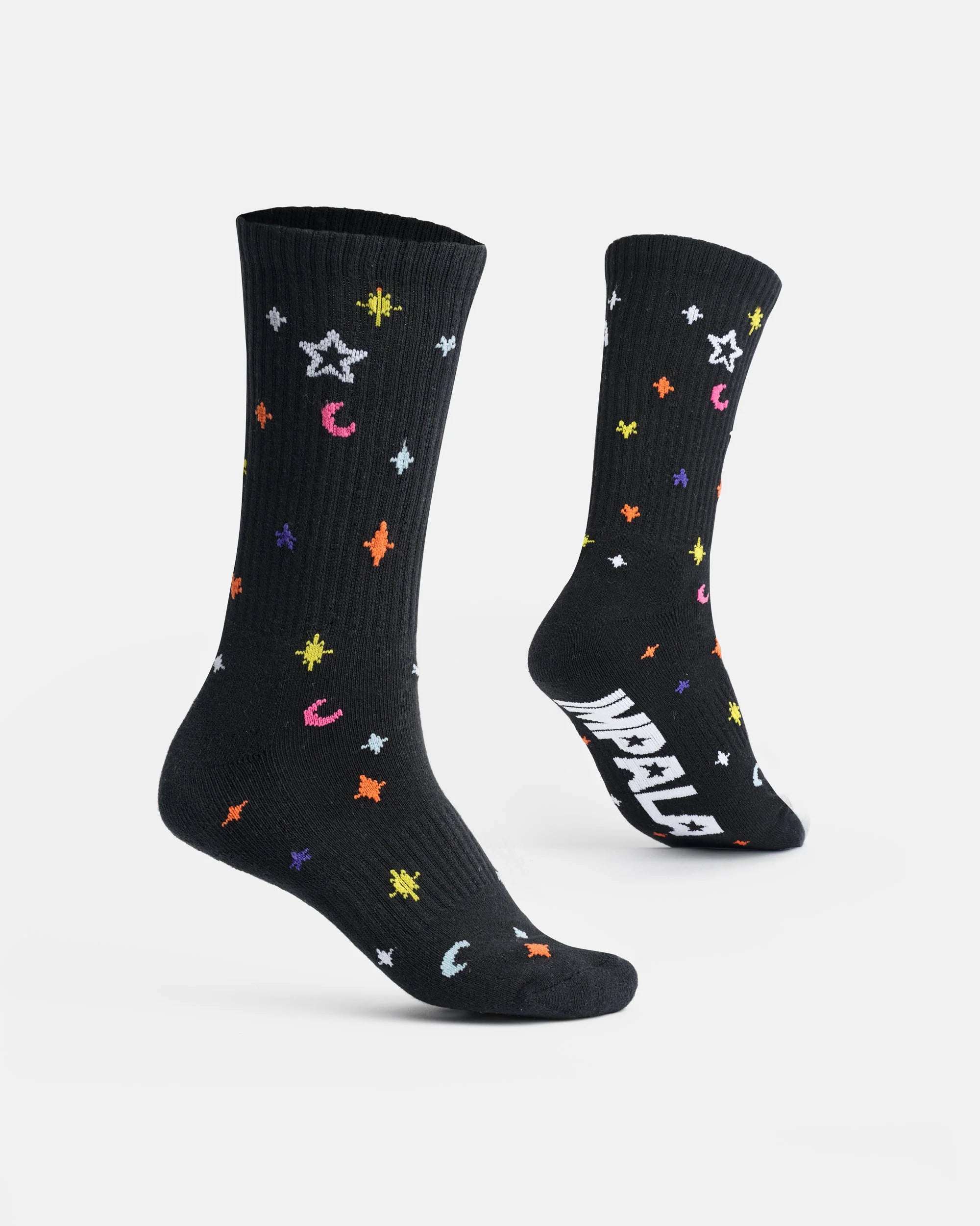 Skate socks with black base, colorful stars and moons, crew length