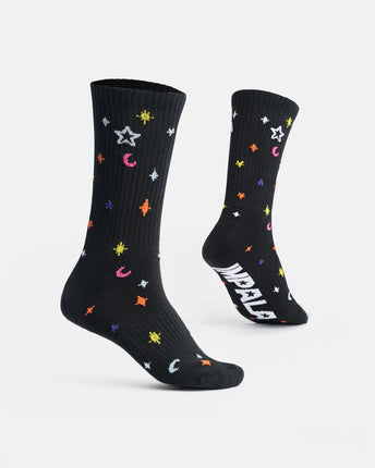 Skate socks with black base, colorful stars and moons, crew length