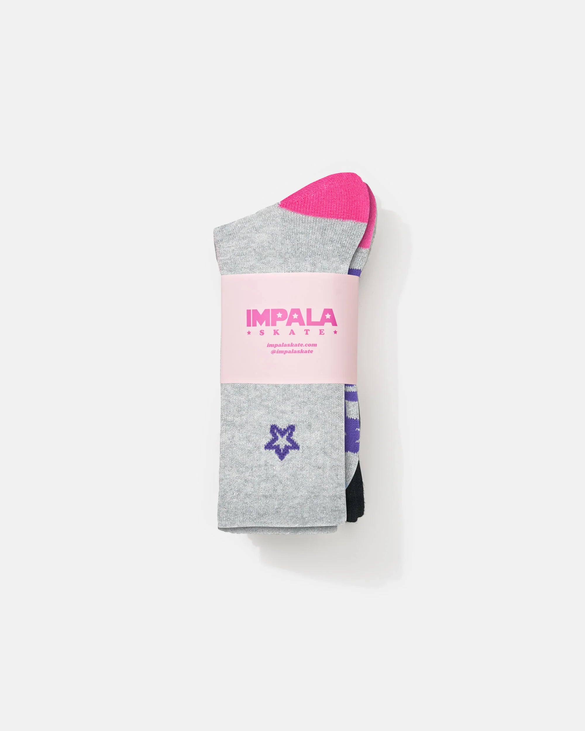 Folded 3-pack skate socks: light gray pair with purple star and pink detail