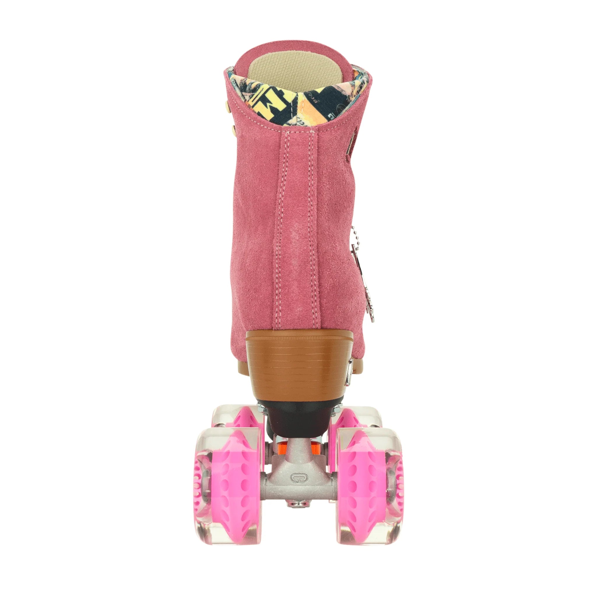 Pink suede roller skates with tan heel, black brake, and pink front wheels