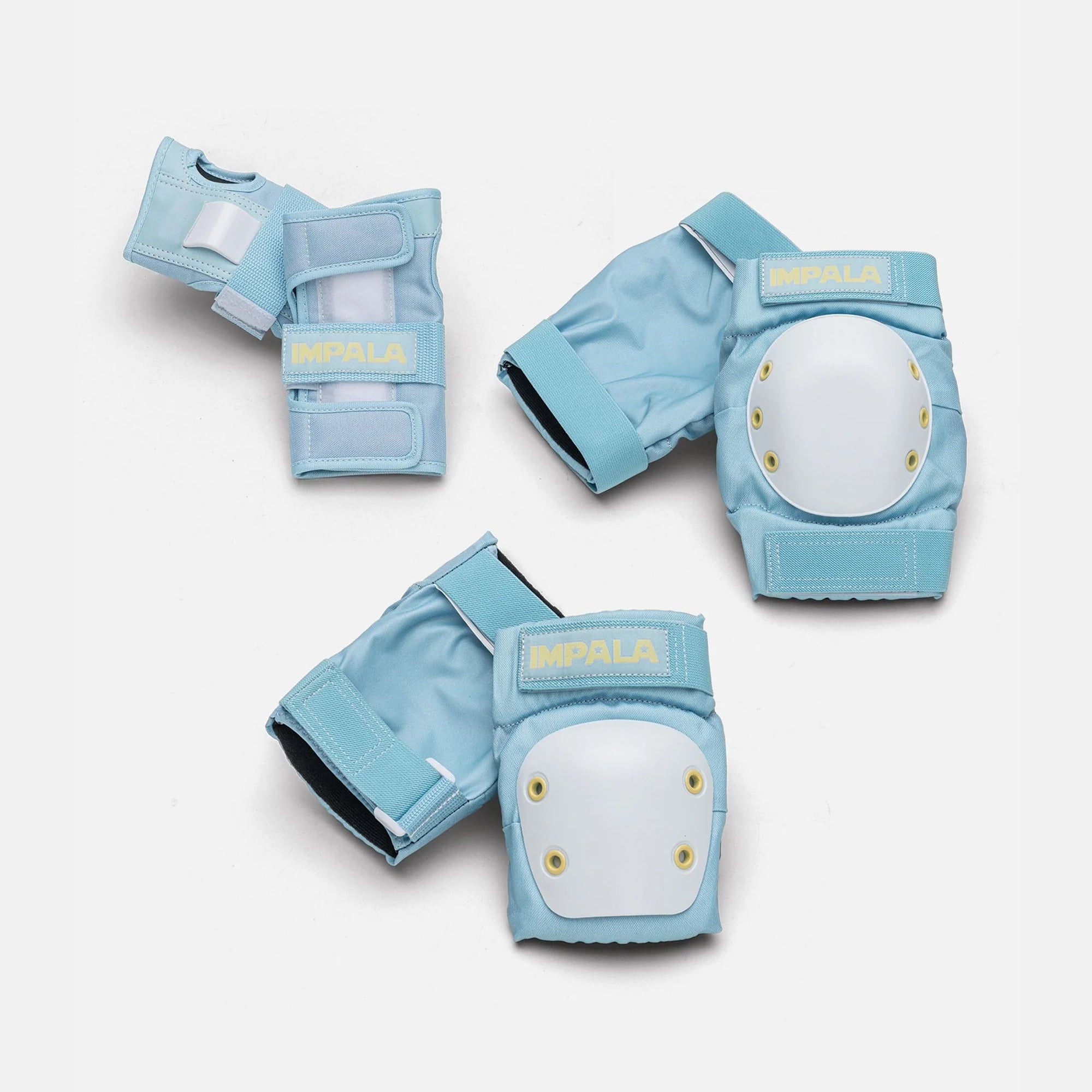 Impala adult protective pads set in light blue with round white shields and yellow studs