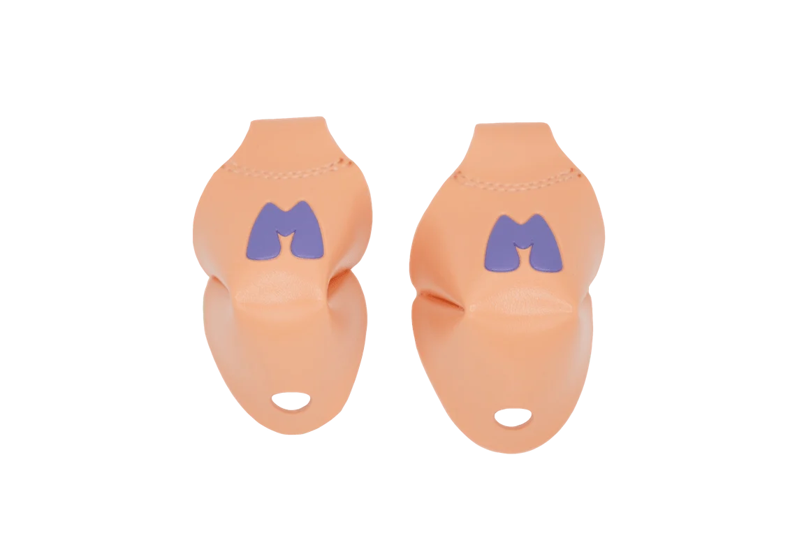 Peach toe caps with navy character logo and stitched seams
