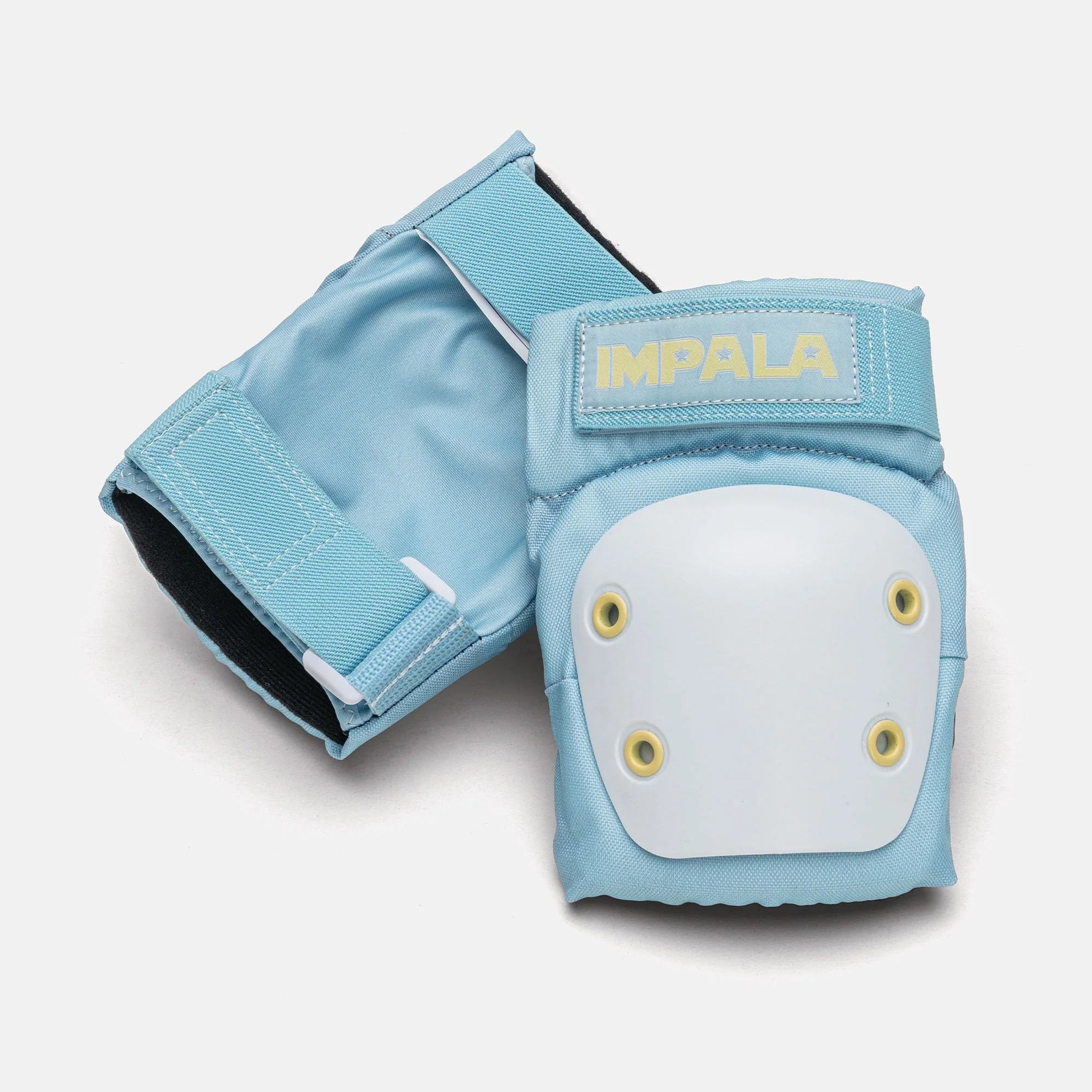 Impala light blue protective pad with round white shield, yellow studs, and adjustable cuff