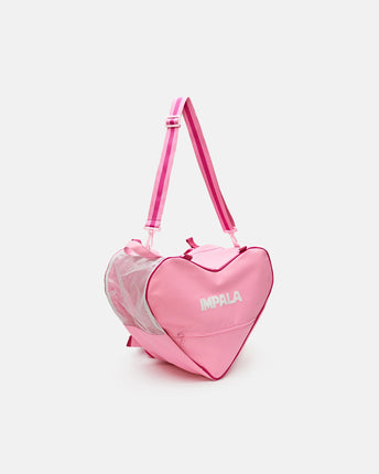 Pink heart-shaped skate bag with Impala logo and dual shoulder straps