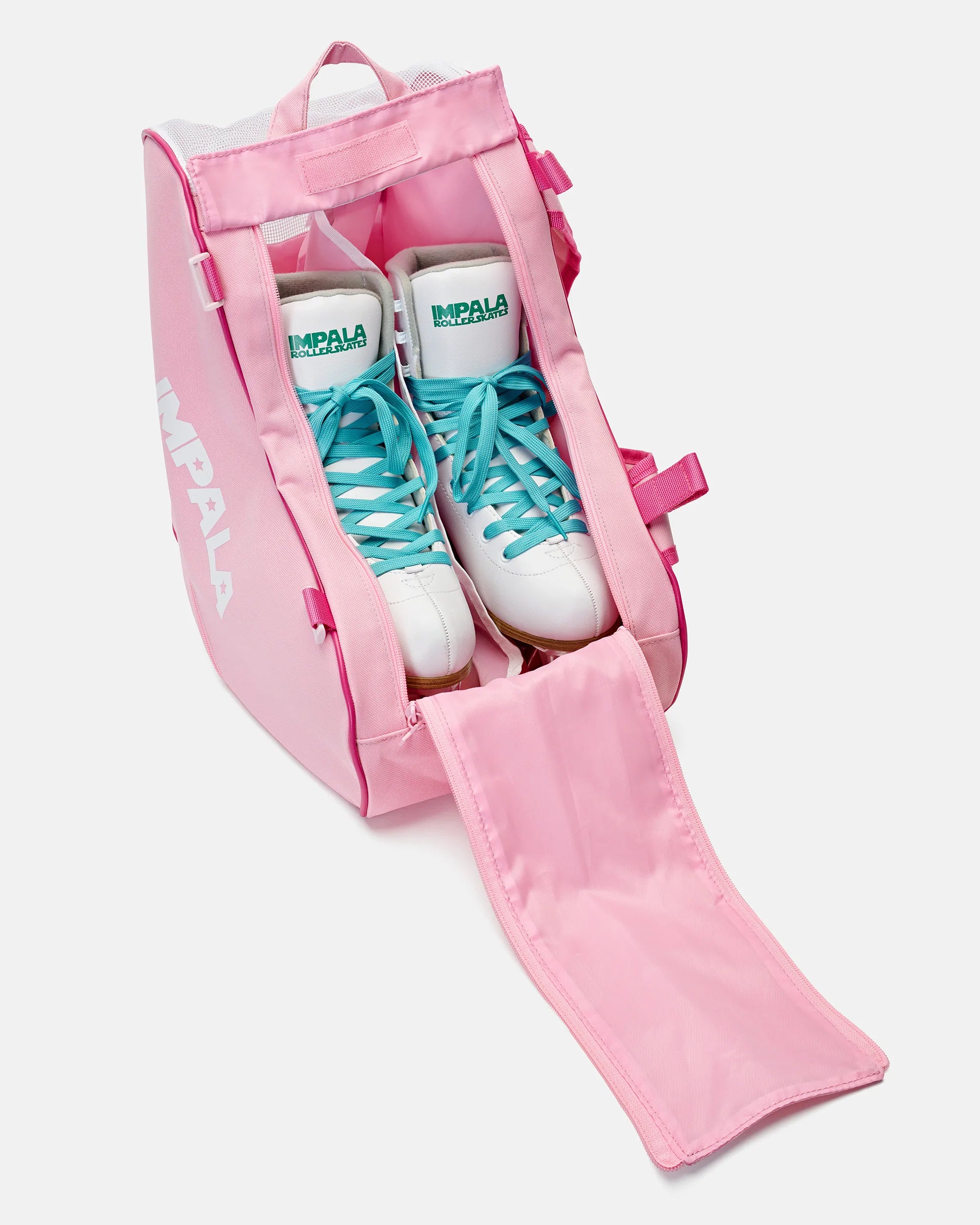 Pink open skate bag with long strap, holding sneakers with teal laces