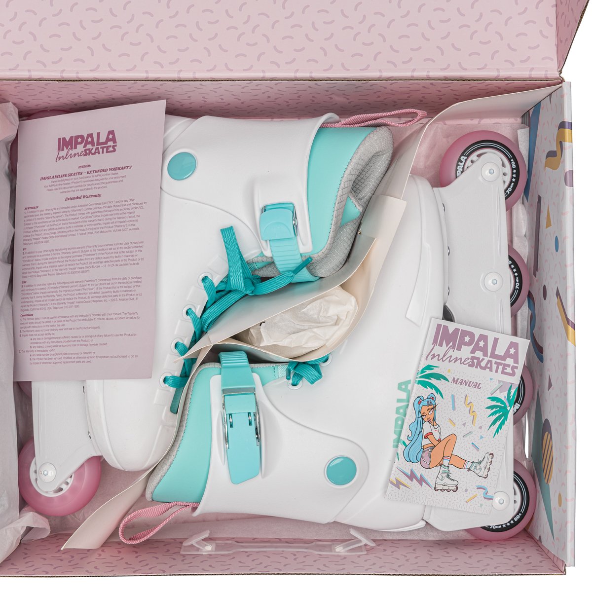 Inline skates in a box set: white boots with mint trim, teal laces, pink wheels