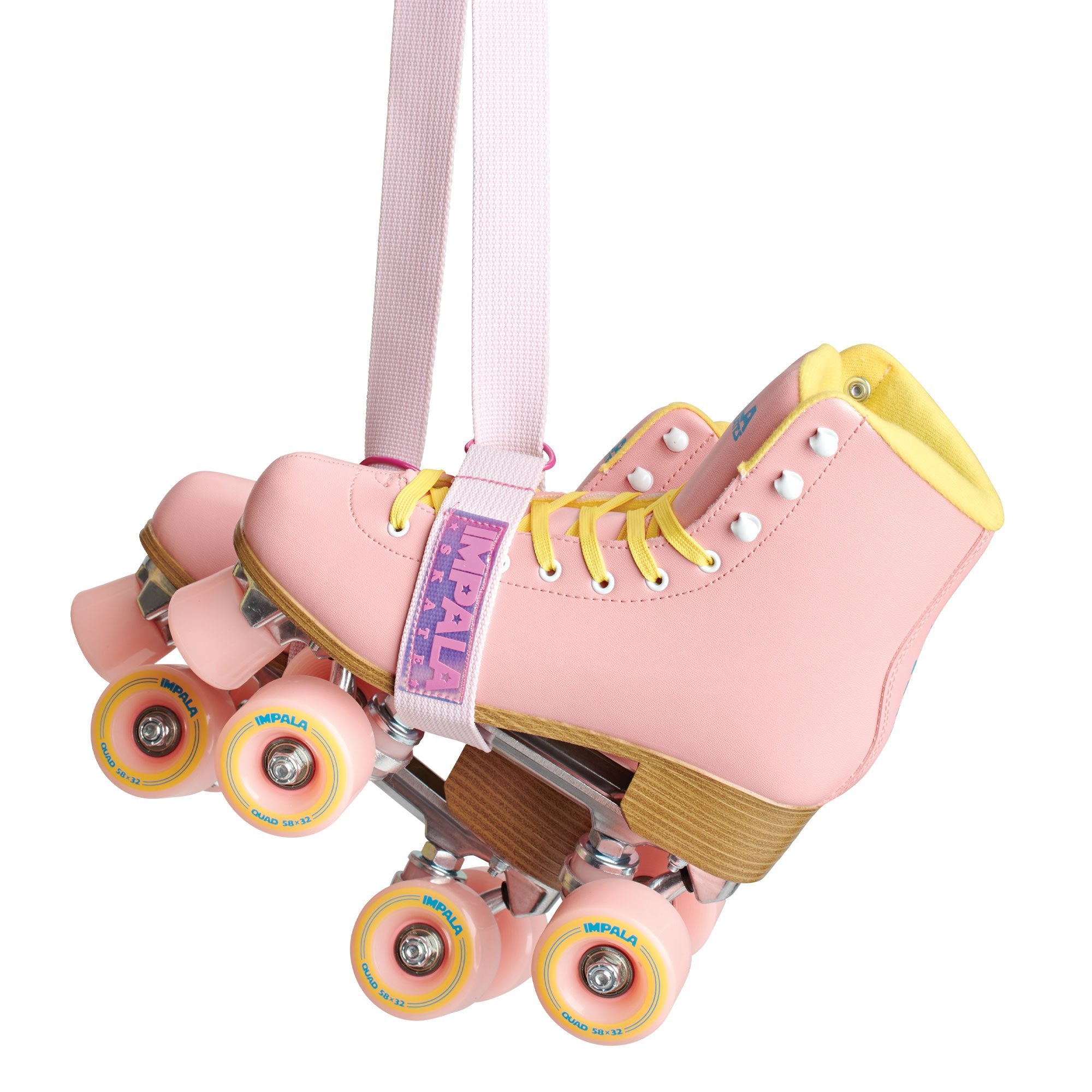 Pink skate strap on roller skates with printed IMPALA tape over toe area