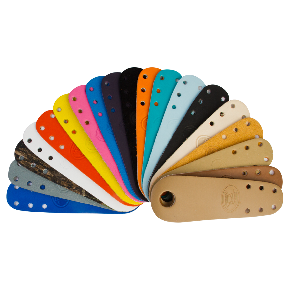 Riedell toe guards pair in mixed colors, curved leather with rivets and ventilation holes