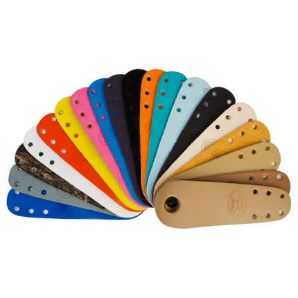 Riedell toe guards pair in mixed colors, curved leather with rivets and ventilation holes