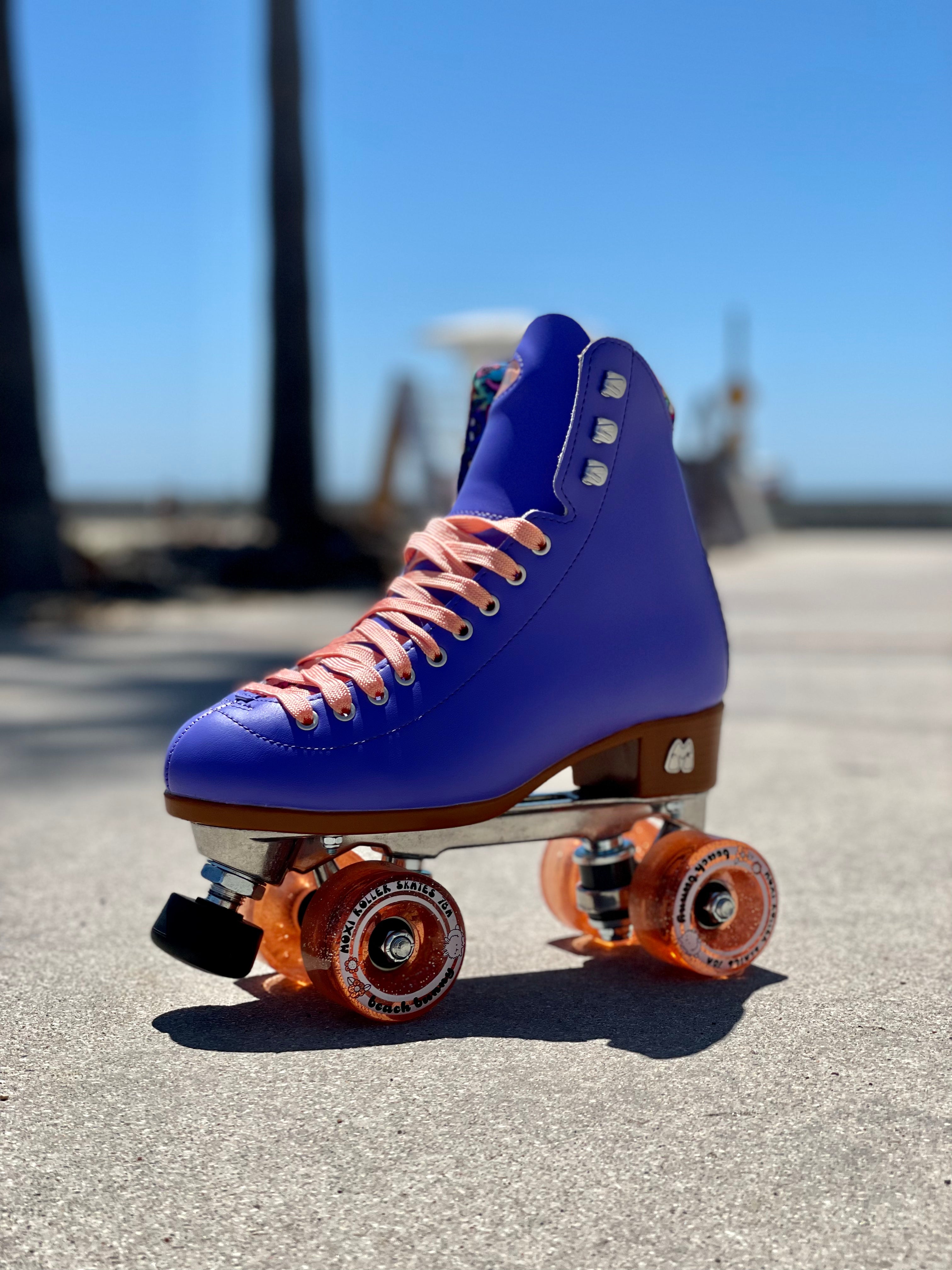 Periwinkle high-top roller skate with orange lace-up and orange wheels