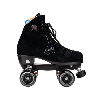 Black high-top roller skates, three-quarter view with suede boot and decorative charm