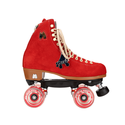 Red suede roller skate with lace-up, cartoon patches, toe stop and wheels