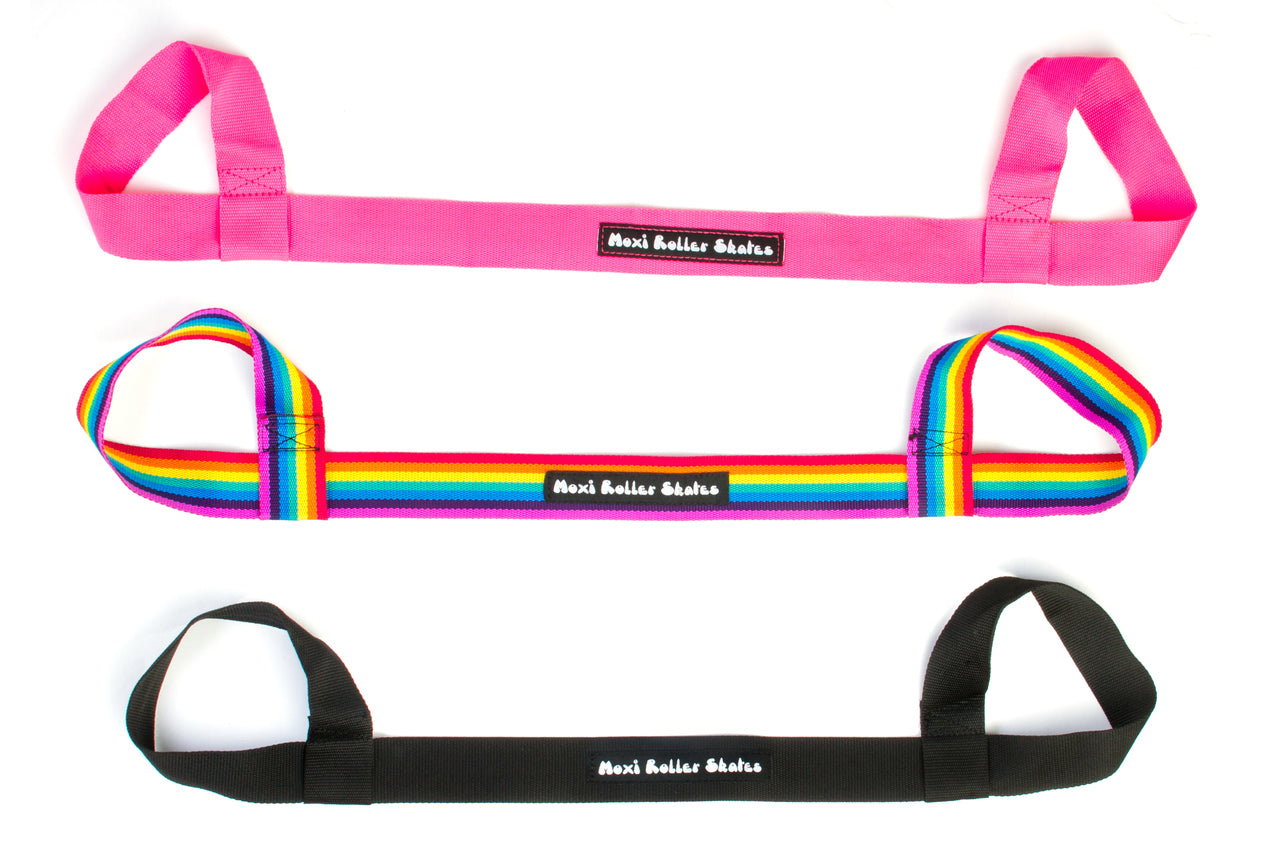 Skate leashes in pink, rainbow, and black with loop strap ends